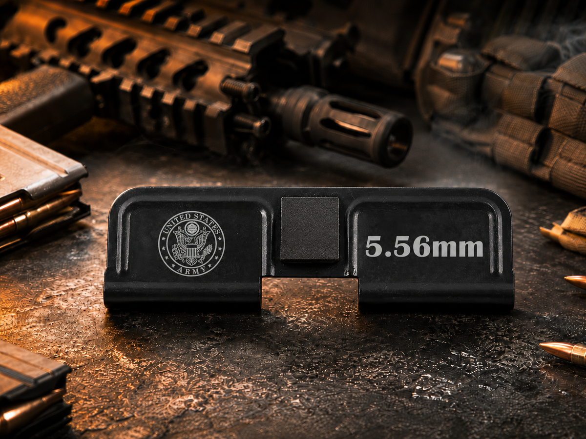 Army AR-15 Dust Cover showing the engraved artwork on both sides of the black steel cover.