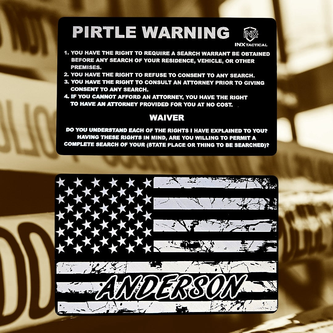 Pirtle Warning Card showing laser-engraved metal card text and artwork.