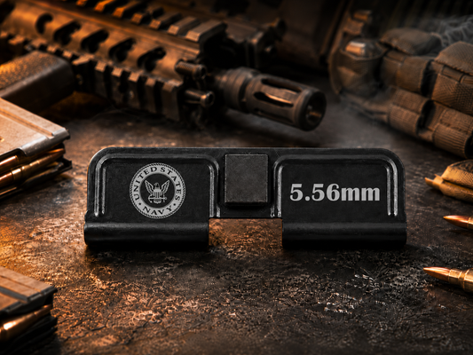 Navy AR-15 Dust Cover showing the engraved artwork on both sides of the black steel cover.