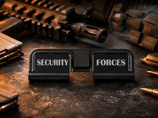 Security Forces AR-15 Dust Cover showing the engraved artwork on both sides of the black steel cover.