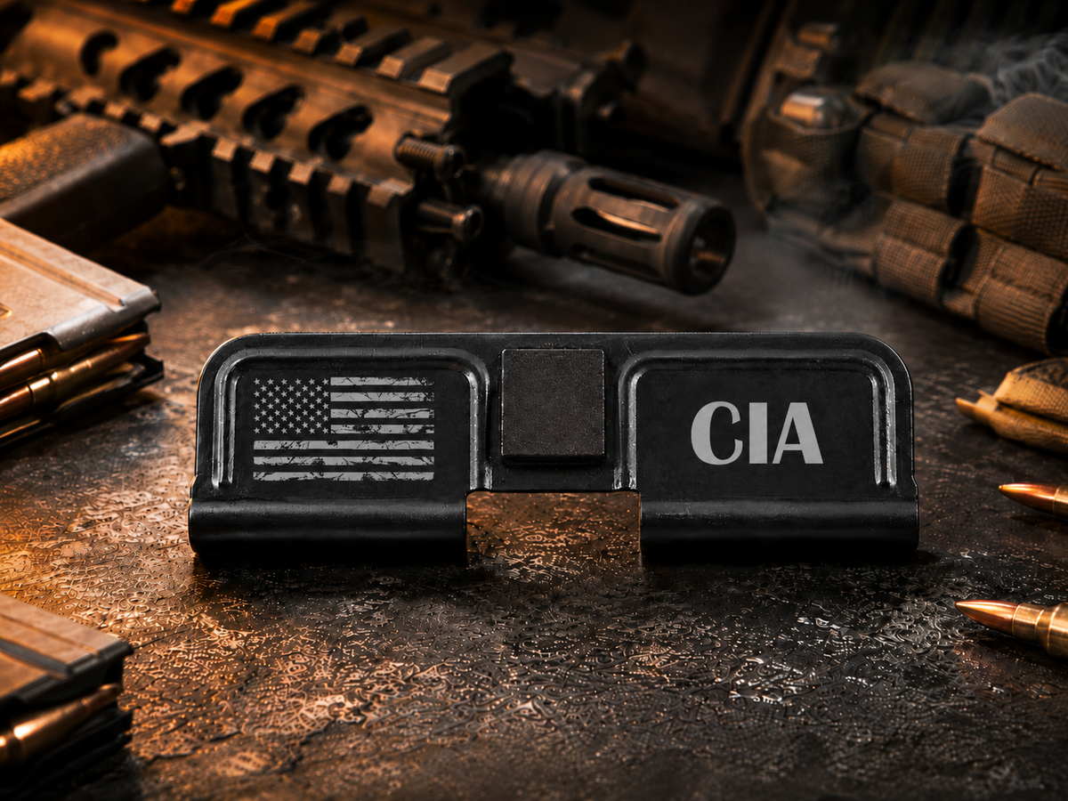 CIA AR-15 Dust Cover showing the engraved artwork on both sides of the black steel cover.