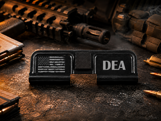 DEA AR-15 Dust Cover showing the engraved artwork on both sides of the black steel cover.