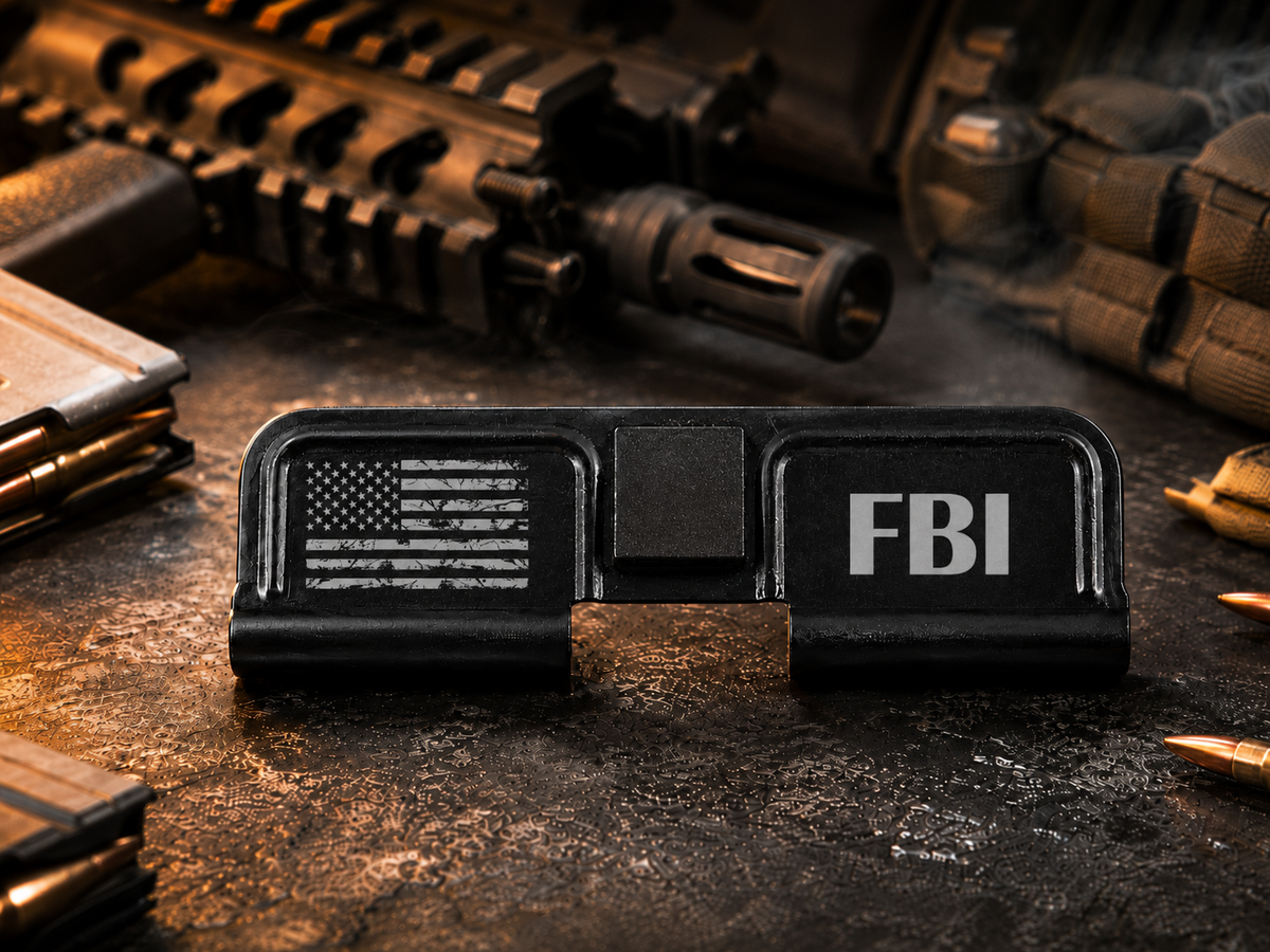 FBI AR-15 Dust Cover showing the engraved artwork on both sides of the black steel cover.