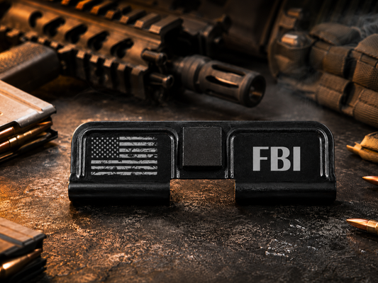 FBI AR-15 Dust Cover showing the engraved artwork on both sides of the black steel cover.