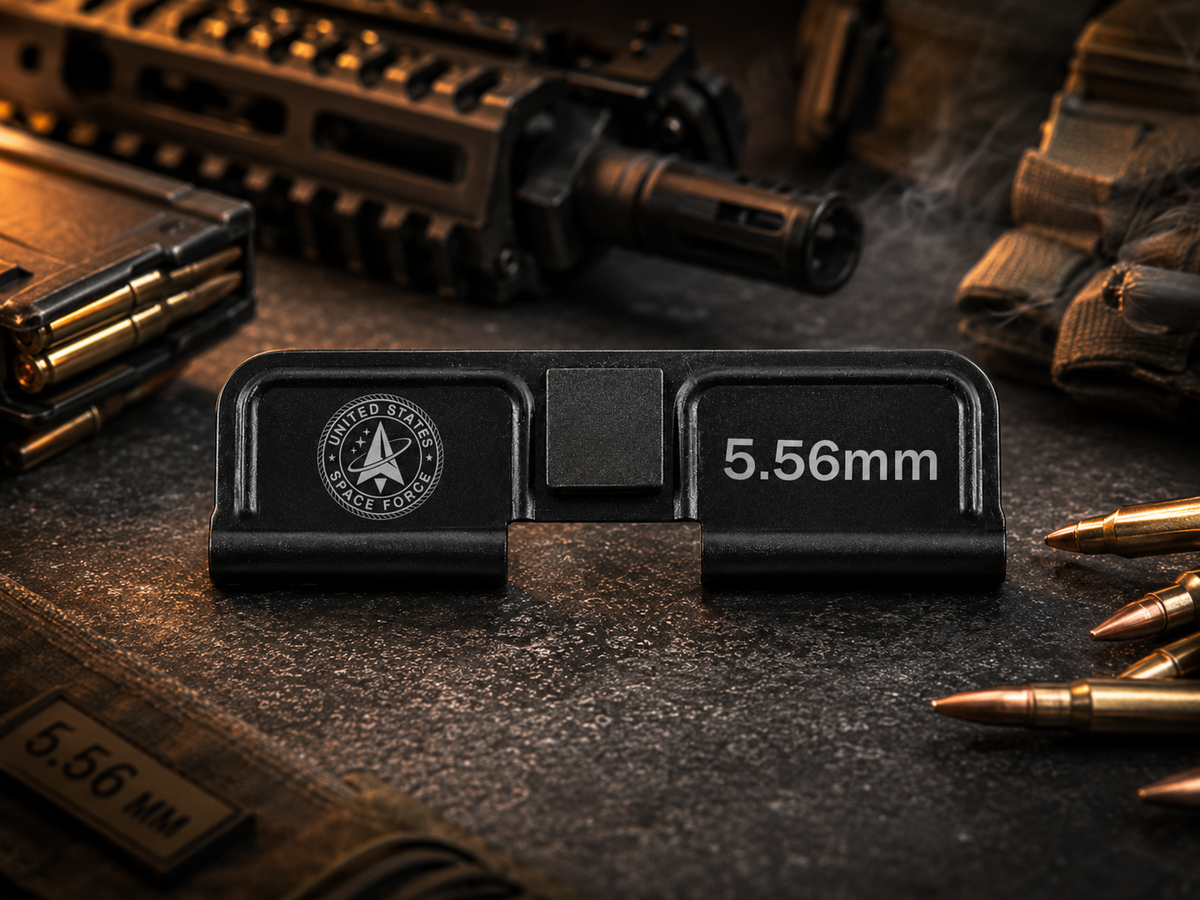 Space Force AR-15 Dust Cover showing the engraved artwork on both sides of the black steel cover.