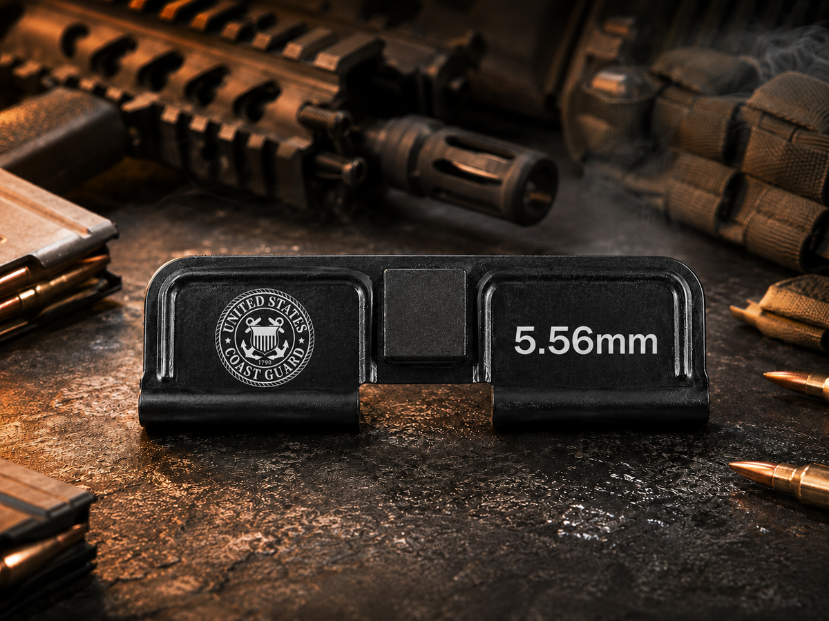 Coast Guard AR-15 Dust Cover showing the engraved artwork on both sides of the black steel cover.