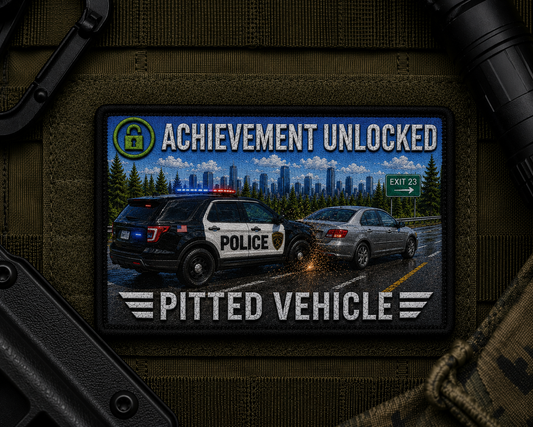 Pitted Vehicle Achievement Patch design with a black border on tactical gear.