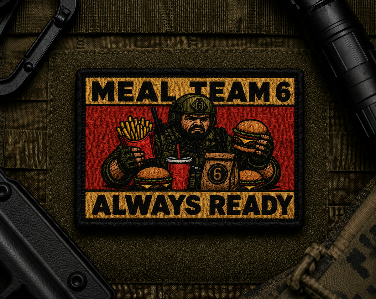Meal Team 6 Patch design with a black border on tactical gear.