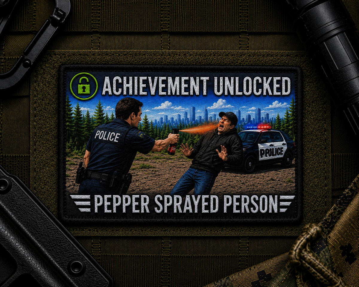 Pepper Spray Achievement Patch design with a black border on tactical gear.