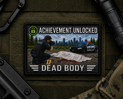 Dead Body Achievement Patch design with a black border on tactical gear.