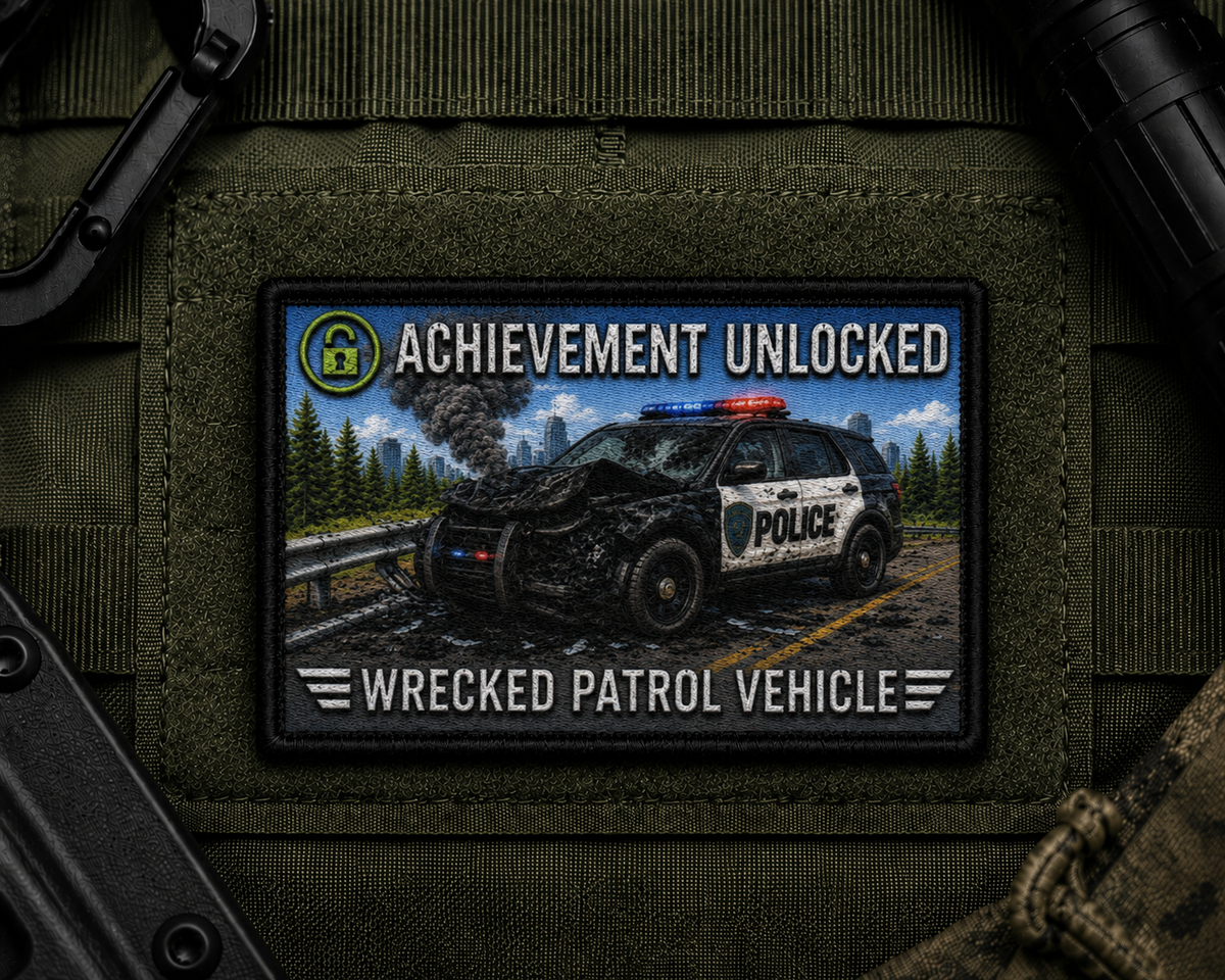 Wrecked Patrol Vehicle Achievement Patch design with a black border on tactical gear.