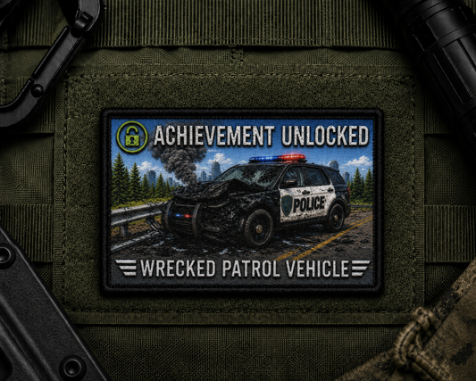 Wrecked Patrol Vehicle Achievement Patch design with a black border on tactical gear.