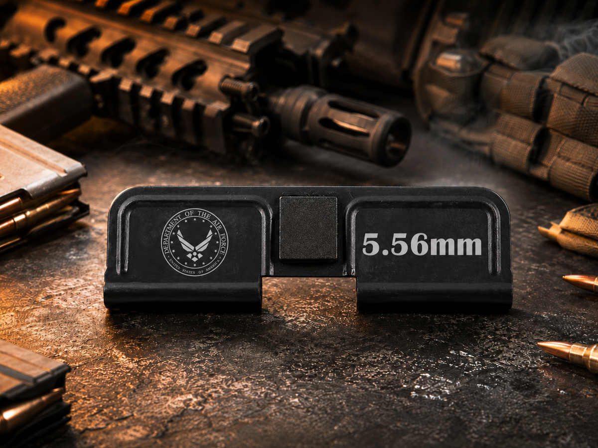 Air Force AR-15 Dust Cover showing the engraved artwork on both sides of the black steel cover.