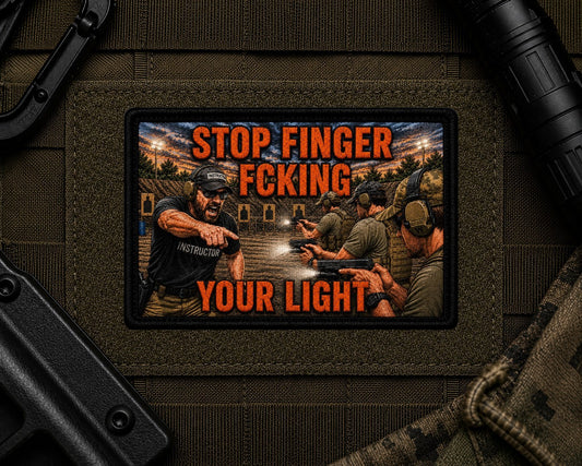 Stop Finger Fcking Your Light Patch design with a black border on tactical gear.