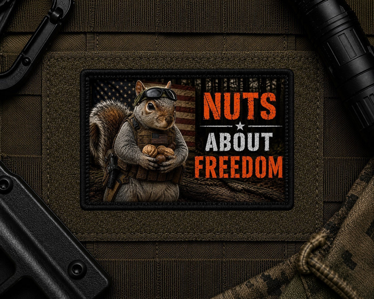 Nuts About Freedom Patch design with a black border on tactical gear.