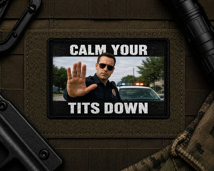 Calm Your Tits Down Patch design with a black border on tactical gear.