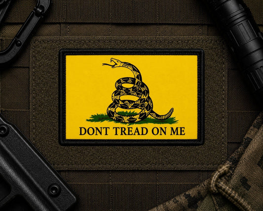 Dont Tread On Me Patch design with a black border on tactical gear.